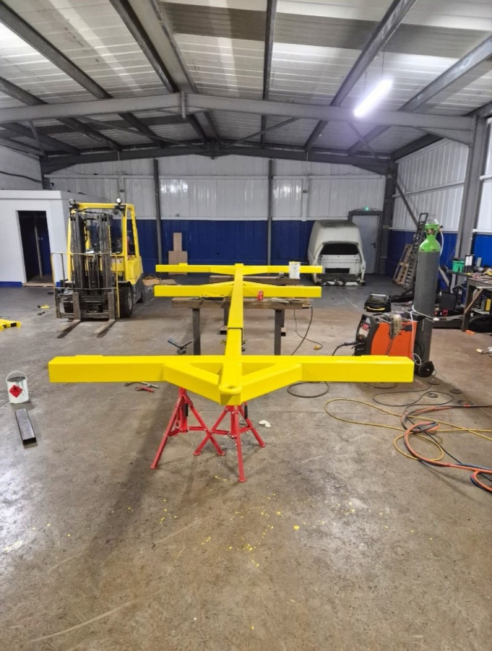 Fabricated steel frame, painted and finished